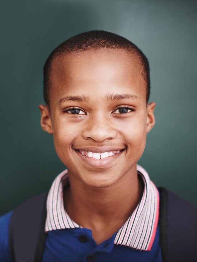 professional school portrait photographer working with students at a Denver school